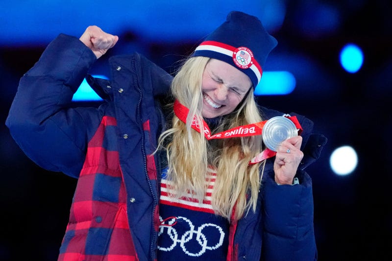 Jessie Diggins (USA) celebrates her silver medal in cross-country skiing women's 30km mass start during the closing ceremony for the Beijing 2022 Olympic Winter Games at Beijing National Stadium. 