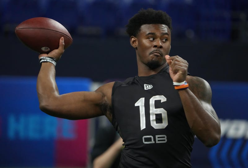 Liberty quarterback Malik Willis (QB16) goes through drills during the 2022 NFL Scouting Combine at Lucas Oil Stadium