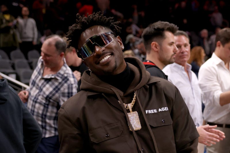 Buccaneers wide receiver Antonio Brown poses for photographers after the game between the Atlanta Hawks and the LA Clippers 