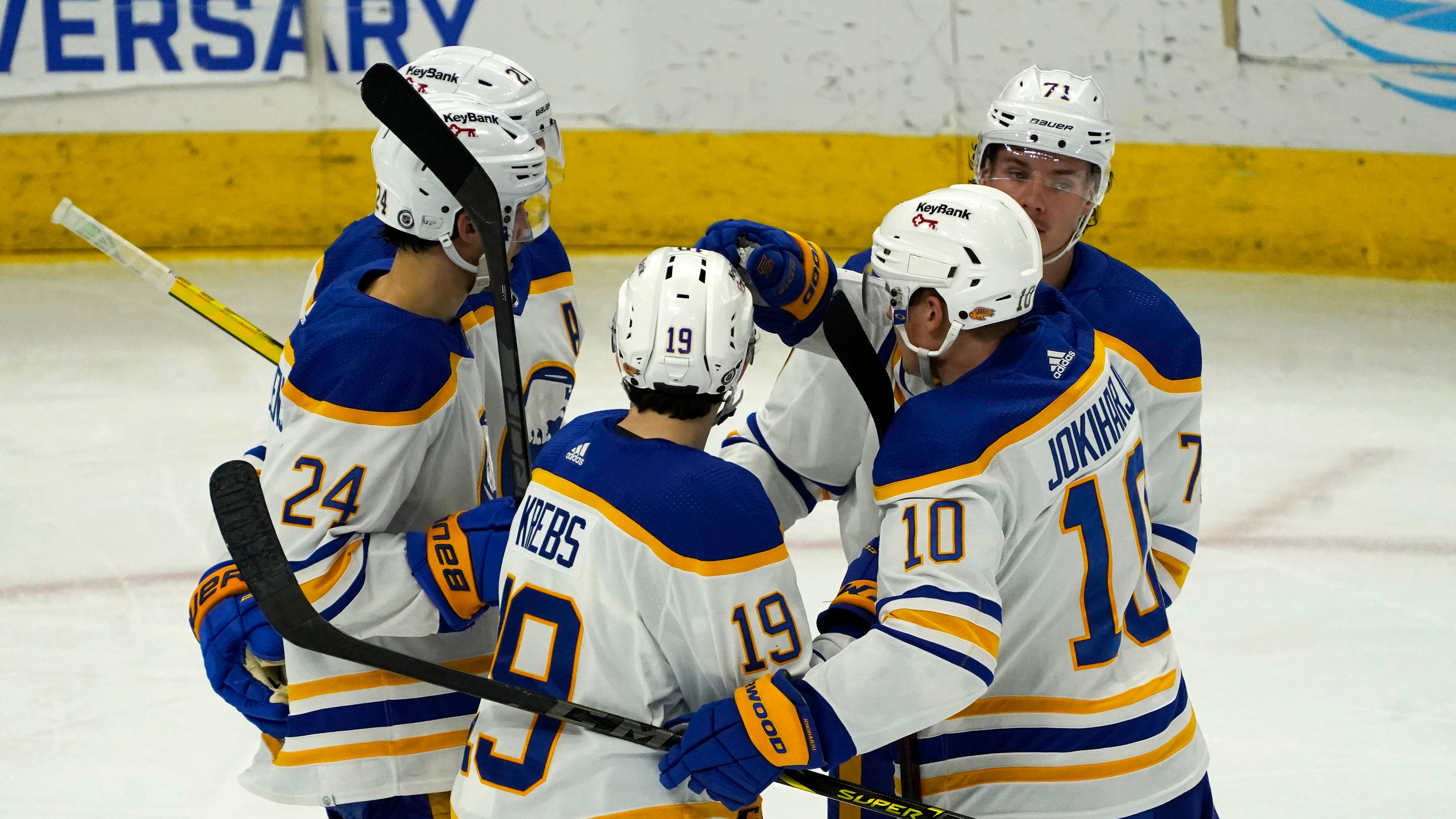 Sabres win a wild one in Chicago