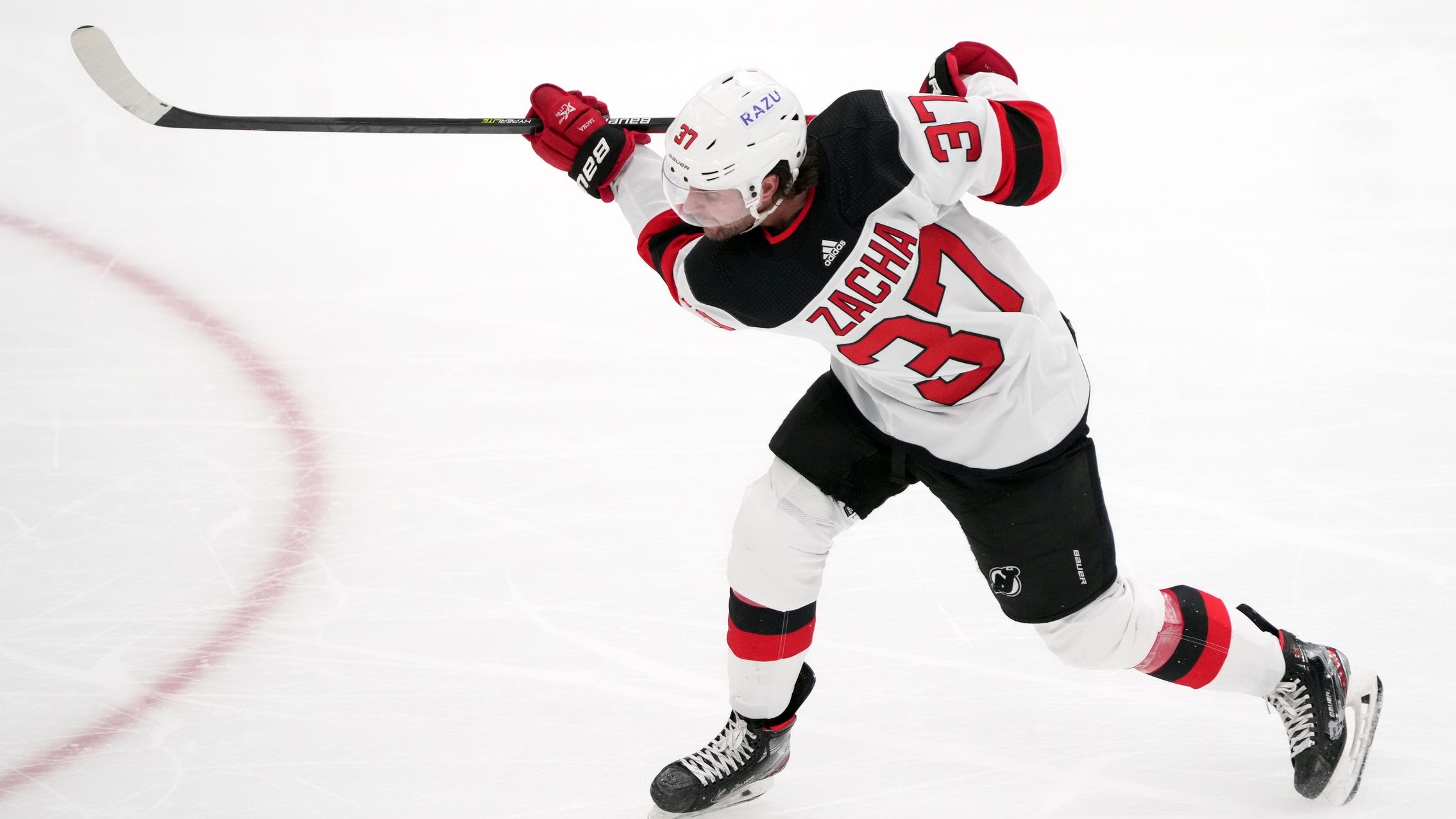 Pavel Zacha ready to take his shot next to Patrice Bergeron