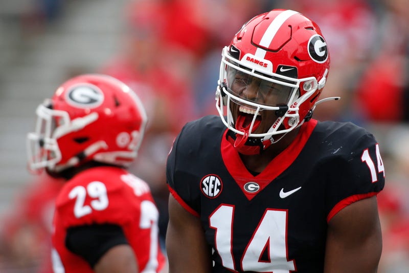 Georgia wide receiver Arik Gilbert (14) celebrates after making a touchdown catch during the G-Day spring football game in Athens, Ga., on Saturday, April 16, 2022. 
