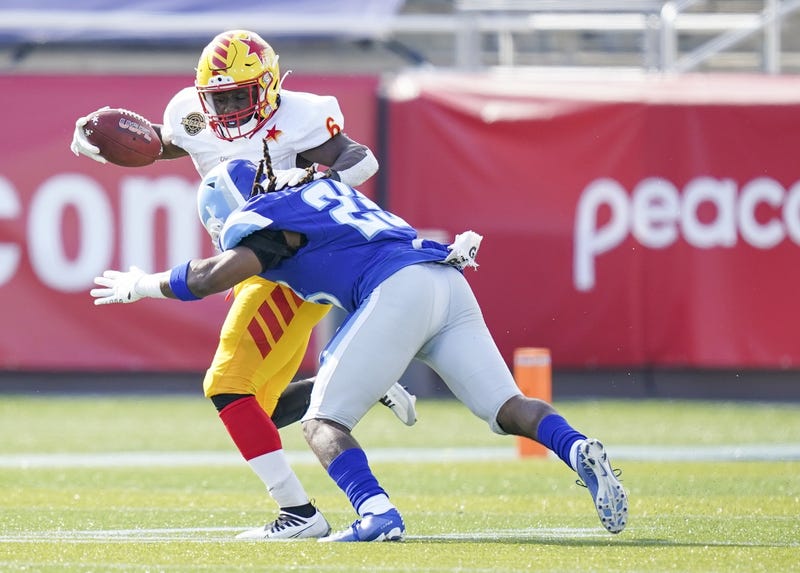 New Orleans Breakers defensive back Jarey Elder (23) tackles Philadelphia Stars running back Darnell Holland (6) during the first half at Protective Stadium in Birmingham, Alabama on April 17, 2022.