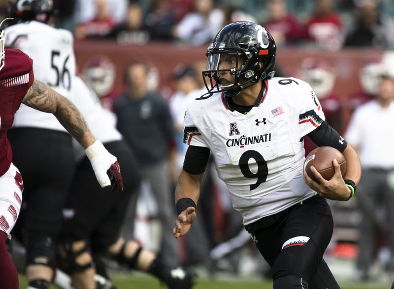 quarterback Desmond Ridder (9) runs downfield during the NCAA football game between Cincinnati Bearcats and Temple Owls on Saturday, Oct. 20, 2018, at Lincoln Financial Field in Philadelphia, Penn.