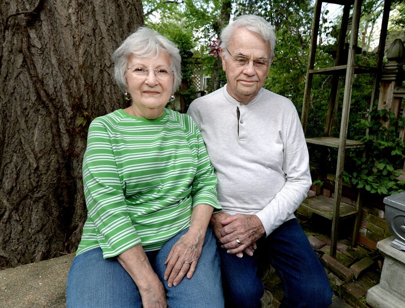 Billye and John Griswold sit in the backyard of their home in White Hall, Illinois after announcing their retirement from the state fair's cooking contest.