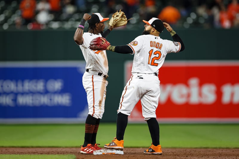 Baltimore Orioles shortstop Jorge Mateo (3) celebrates with second baseman Rougned Odor (12) after the game against the Minnesota Twins at Oriole Park at Camden Yards.