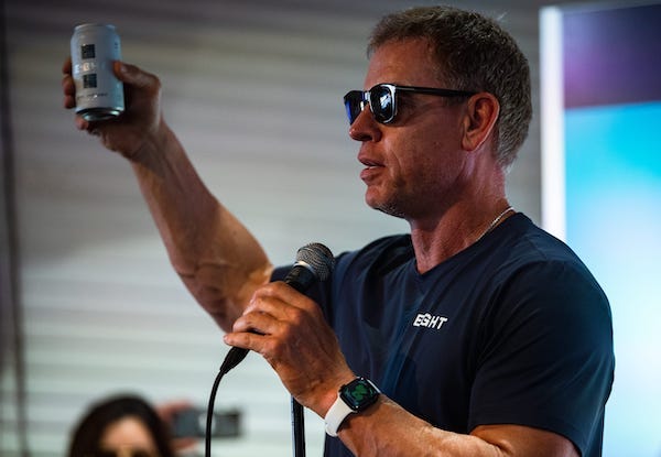 all of Fame Cowboys quarterback Troy Aikman speaks on a stage at Brewster Street Icehouse on Wednesday, May 18. Aikman visited three bars in Corpus Christi on Wednesday to promote his new beer, Eight Elite Lager