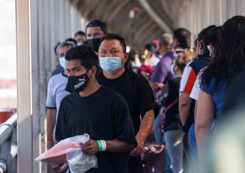 Migrants are expelled to Ciudad Juarez by Customs and Border Protection on the Paso del Norte International Bridge under Title 42 on May 18, 2022. 