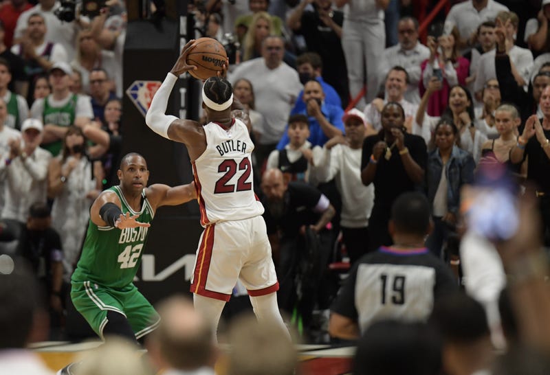 Miami Heat forward Jimmy Butler attempts a game-winning three-pointer as Boston Celtics center Al Horford defends in the fourth quarter of Game 7 of the 2022 Eastern Conference finals at FTX Arena. Butler missed the shot.