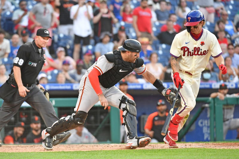 San Francisco Giants catcher Curt Casali (2) tags out Philadelphia Phillies center fielder Mickey Moniak (16) for the final out during the 10th inning at Citizens Bank Park, May 30, 2022.