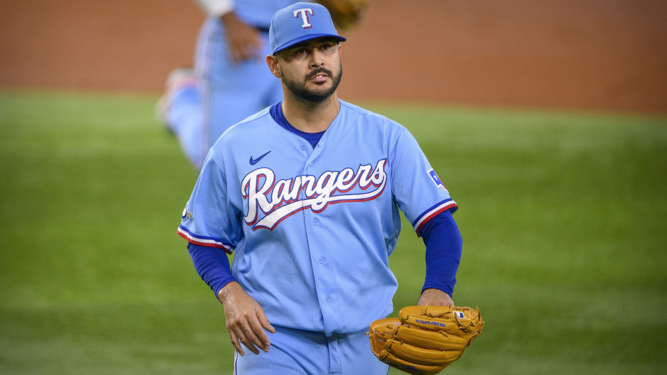 Should the Rangers keep or trade Martin Perez?