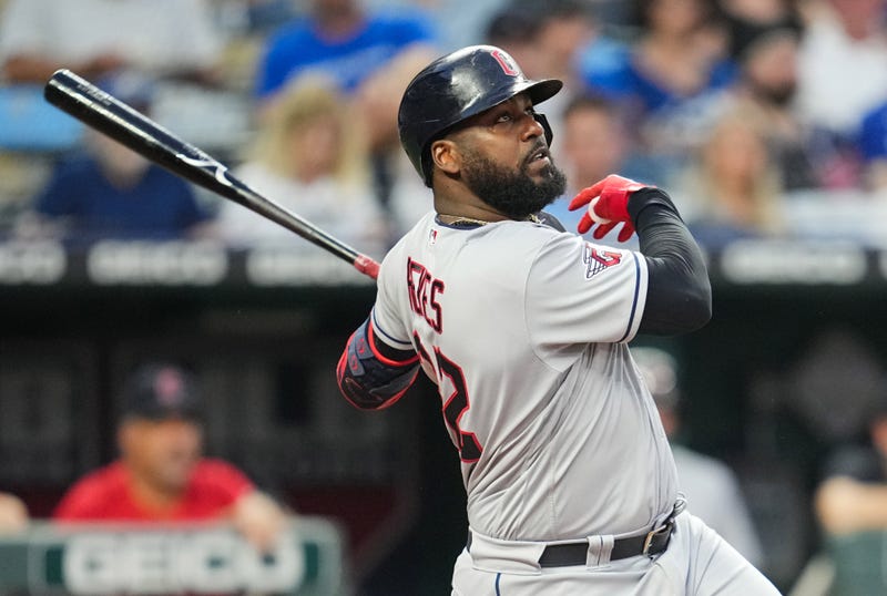Cleveland Guardians designated hitter Franmil Reyes (32) hits a home run against the Kansas City Royals during the seventh inning at Kauffman Stadium. 