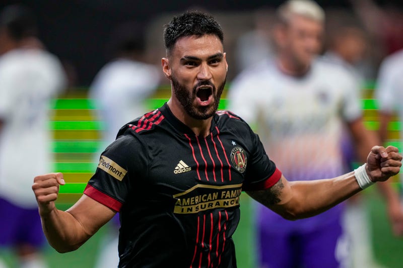 Jul 17, 2022; Atlanta, Georgia, USA; Atlanta United defender Juan Jose Sanchez Purata (22) reacts after scoring a goal against Orlando City during the second half at Mercedes-Benz Stadium. 