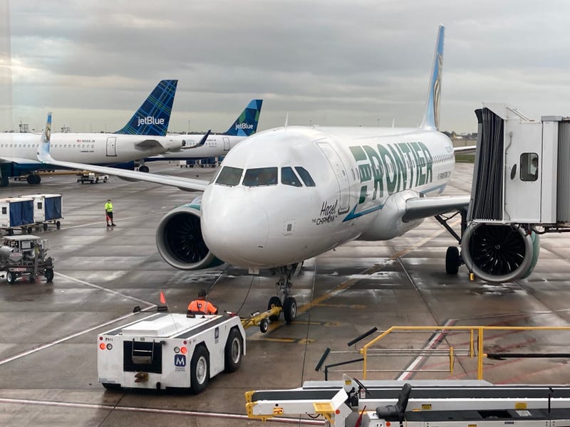 A Frontier Airlines plane is seen at Orlando International Airport in July 2022.