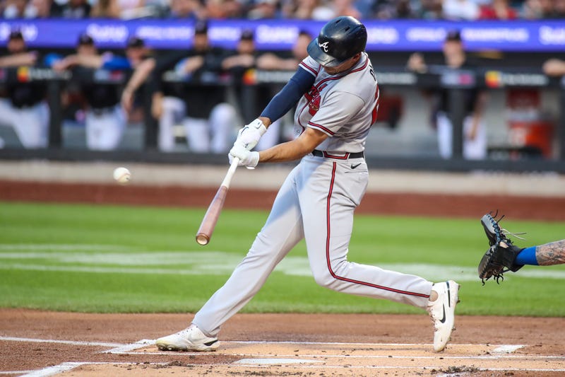 Aug 5, 2022; New York City, New York, USA; Atlanta Braves first baseman Matt Olson (28) hits a double in the first inning against the New York Mets at Citi Field. 