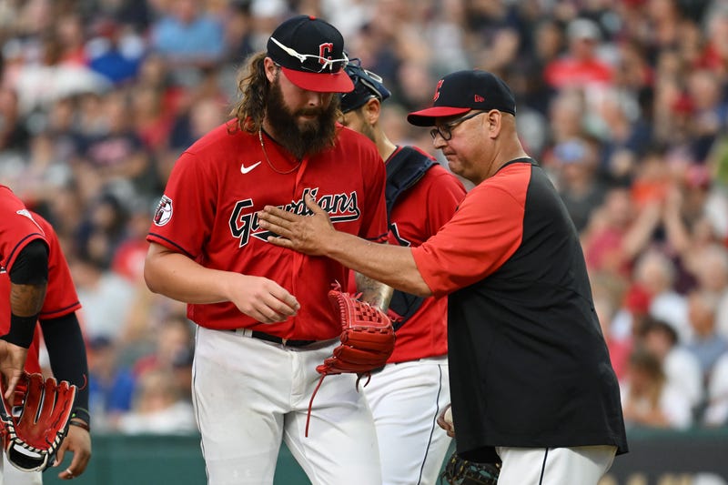 Cleveland Guardians manager Terry Francona relieves starting pitcher Hunter Gaddis (70) during the fourth inning against the Houston Astros at Progressive Field.