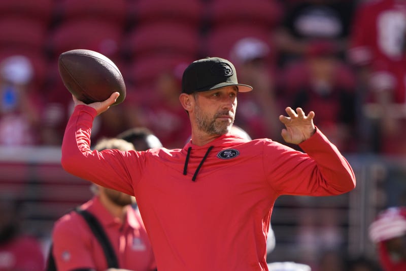 San Francisco 49ers head coach Kyle Shanahan throws the football before the game against the Green Bay Packers at Levi's Stadium.