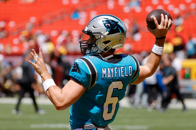 Baker Mayfield models the Panthers blue uniforms. 