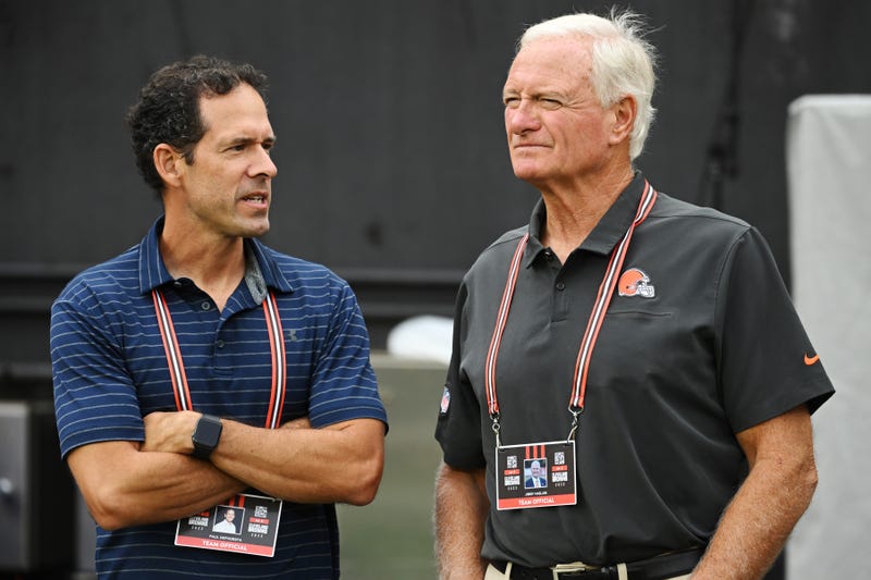 Cleveland Browns chief strategy officer Paul DePodesta, left, talks with managing and principal partner Jimmy Haslam before the game between the Cleveland Browns and the Philadelphia Eagles at FirstEnergy Stadium. 