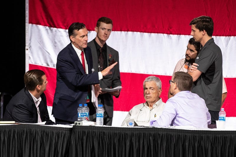 Ralph Rebandt talks to Michigan Republican Party chairman Ron Weiser