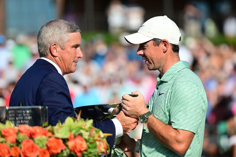 Rory McIlroy and Jay Monahan