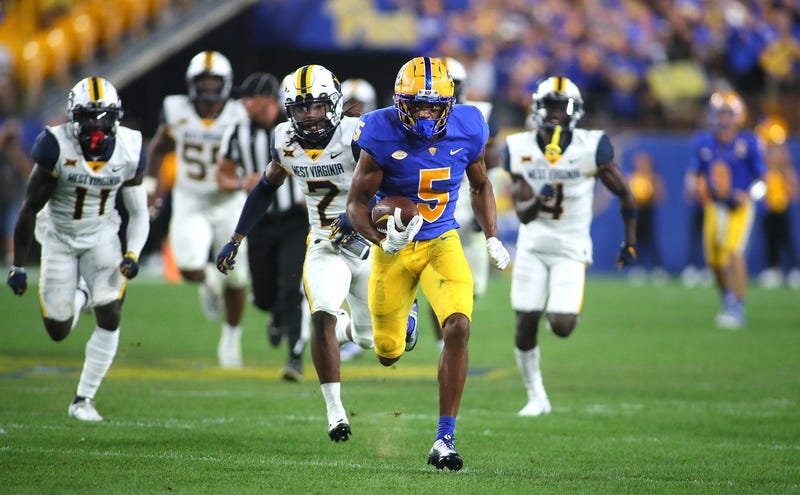 Jared Wayne (5) of the Pittsburgh Panthers sprints downfield after getting a breakaway during the second half of the Backyard Brawl against the West Virginia Mountaineers
