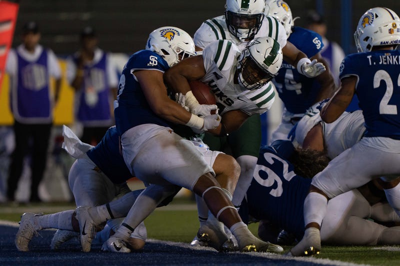 San Jose State Spartans defensive lineman Viliami Fehoko (42) tackles Portland State Vikings running back Andrew Van Buren (21) during the fourth quarter at CEFCU Stadium.