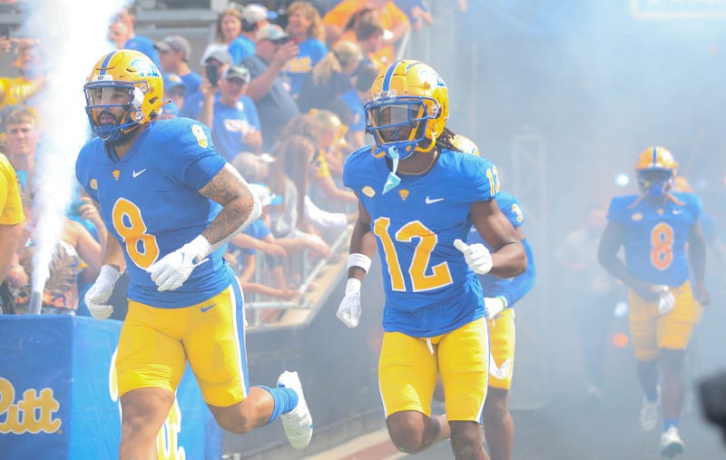 Pitt's MJ Devonshire coming on the field with Karter Johnson