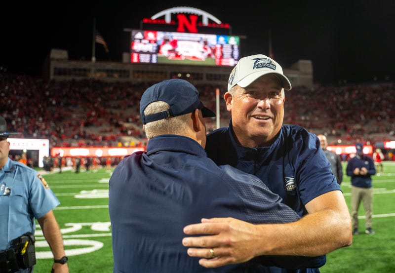 Sep 10, 2022; Lincoln, Nebraska, USA; Georgia Southern Eagles head coach Clay Helton celebrates with an assistant after defeating the Nebraska Cornhuskers at Memorial Stadium.