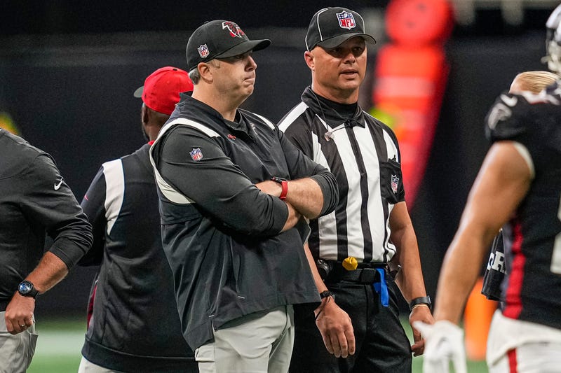 Sep 11, 2022; Atlanta, Georgia, USA; Atlanta Falcons head coach Arthur Smith talks with an official on the field prior to the game against the New Orleans Saints at Mercedes-Benz Stadium.