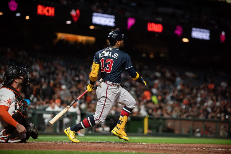 Sep 13, 2022; San Francisco, California, USA; Atlanta Braves right fielder Ronald Acuna Jr. (13) hits a single during the third inning against the San Francisco Giants at Oracle Park.