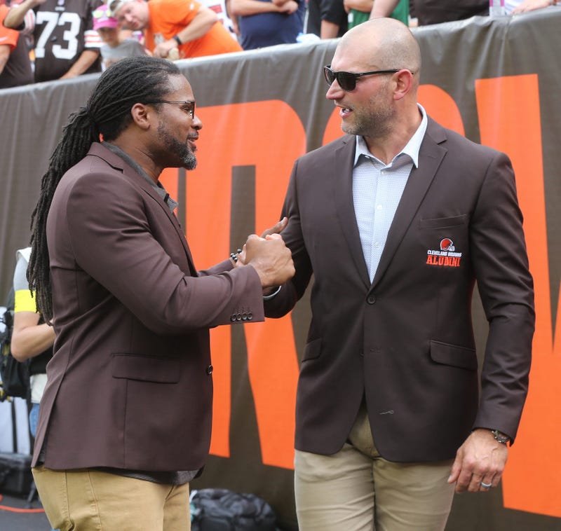 Former Browns WR/kick returner Josh Cribbs (left) and Hall of Fame left tackle Joe Thomas