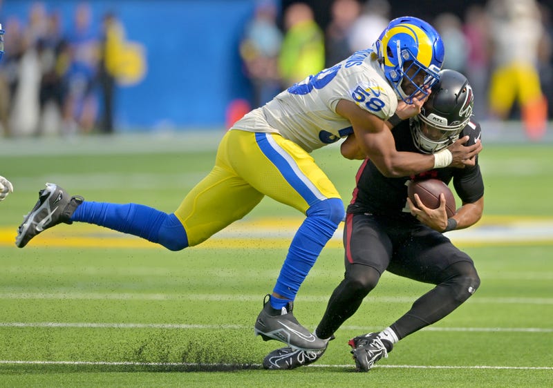 Sep 18, 2022; Inglewood, California, USA; Los Angeles Rams linebacker Justin Hollins (58) sacks Atlanta Falcons quarterback Marcus Mariota (1) in the fourth quarter at SoFi Stadium.