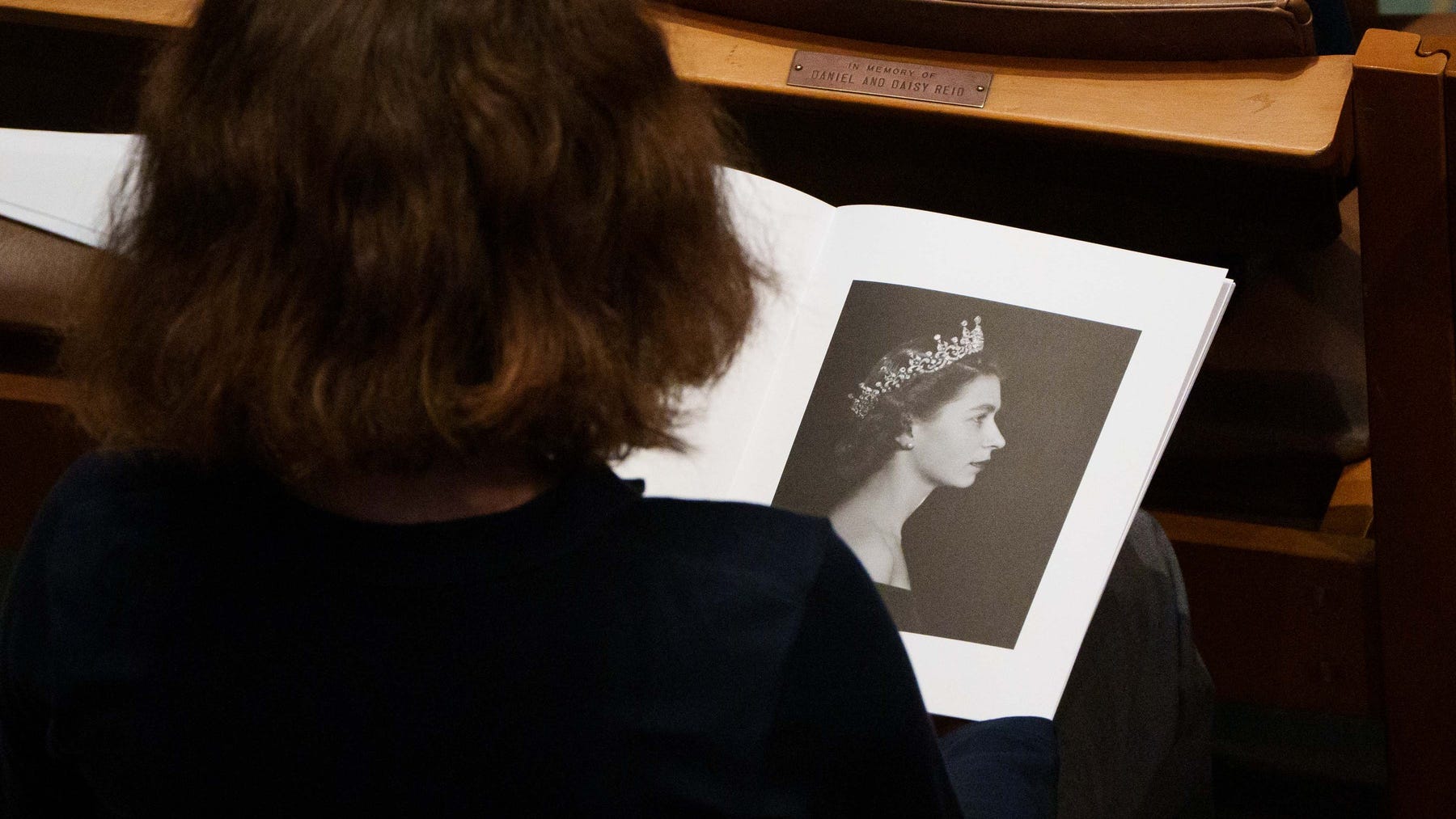 Man throws himself on queen's coffin claiming she's still alive