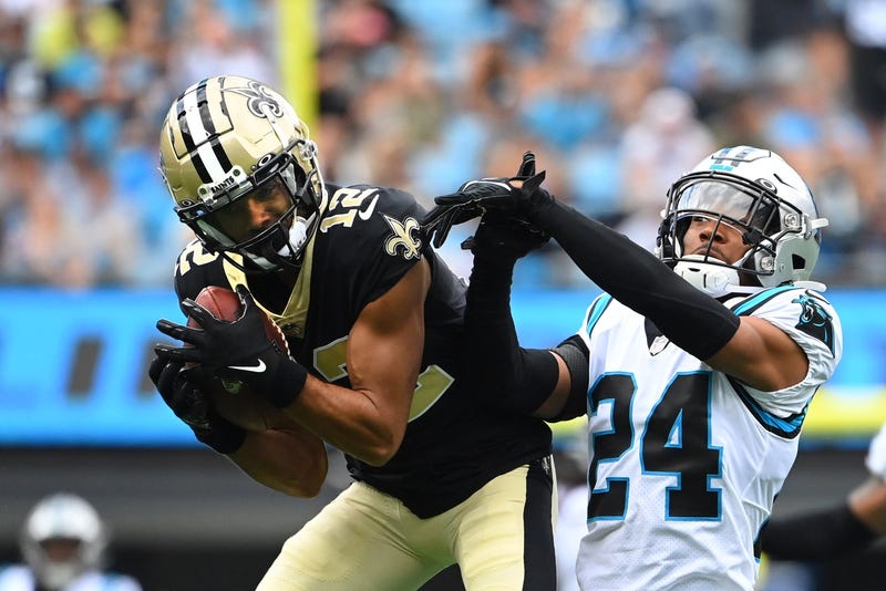 Saints WR Chris Olave hauls in a deep shot in the first half against the Panthers. 