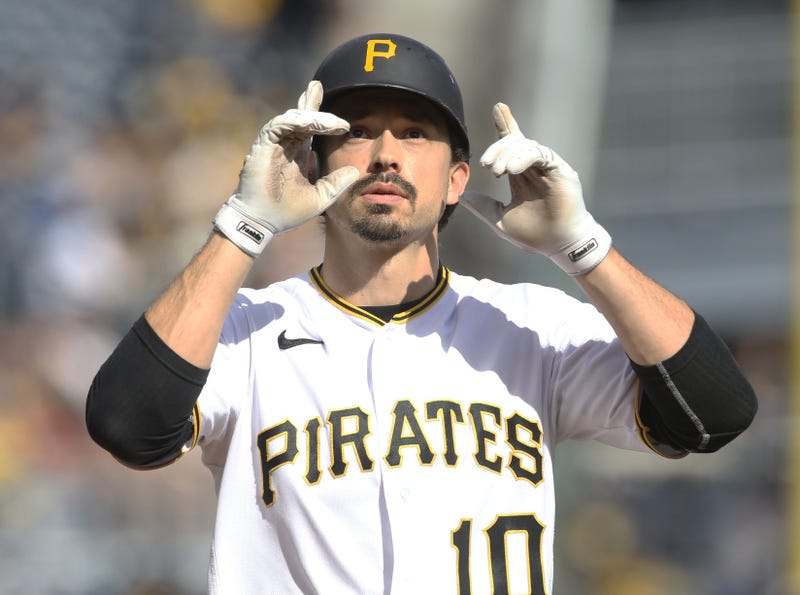Pittsburgh Pirates center fielder Bryan Reynolds (10) reacts crossing home plate on a solo home run