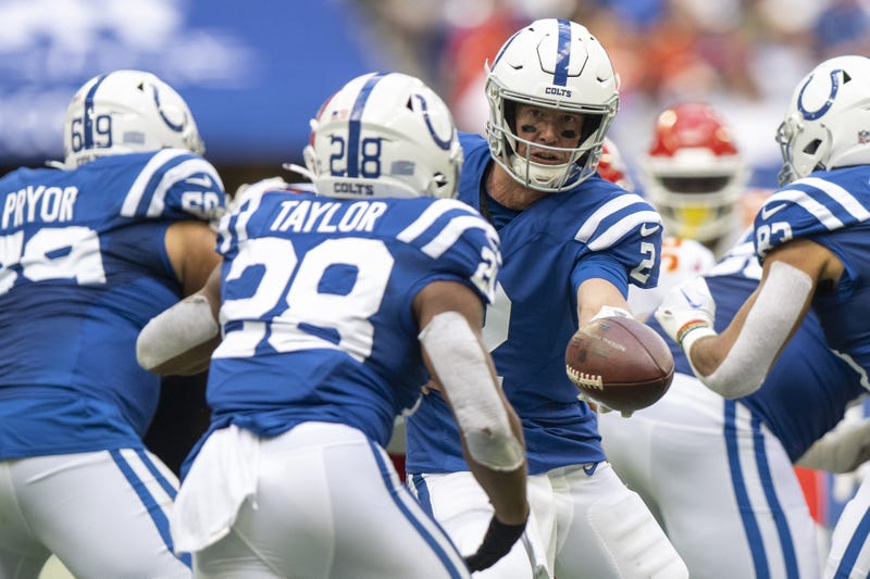 Sep 25, 2022; Indianapolis, Indiana, USA; Indianapolis Colts quarterback Matt Ryan (2) hands the ball off to running back Jonathan Taylor (28) during the second half against the Kansas City Chiefs at Lucas Oil Stadium.