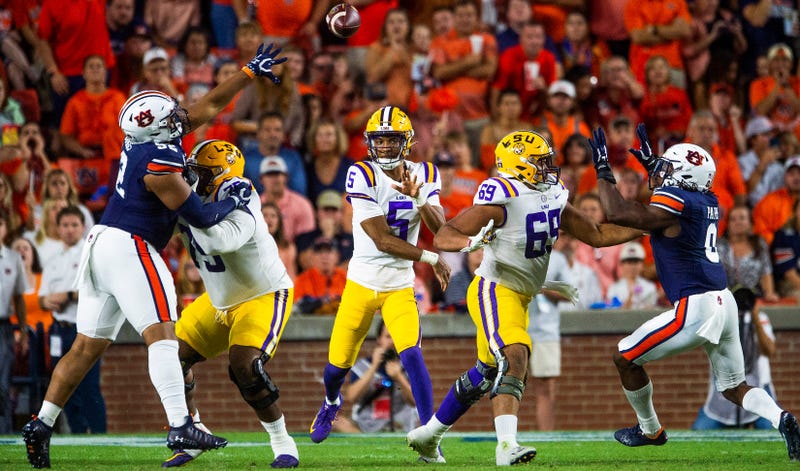 LSU Tigers quarterback Jayden Daniels (5) throws against Auburn as the Auburn Tigers take on the LSU Tigers