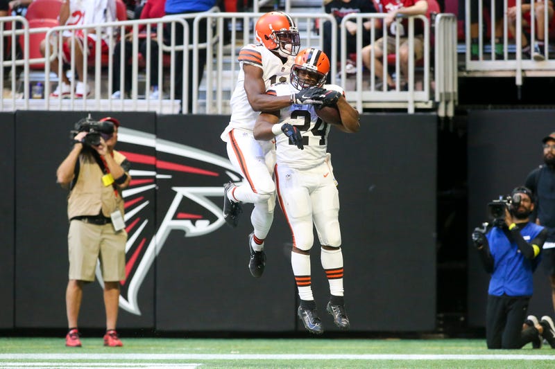 Oct 2, 2022; Atlanta, Georgia, USA; Cleveland Browns running back Nick Chubb (24) celebrates after a touchdown run with wide receiver Donovan Peoples-Jones (11) against the Atlanta Falcons in the second half at Mercedes-Benz Stadium.
