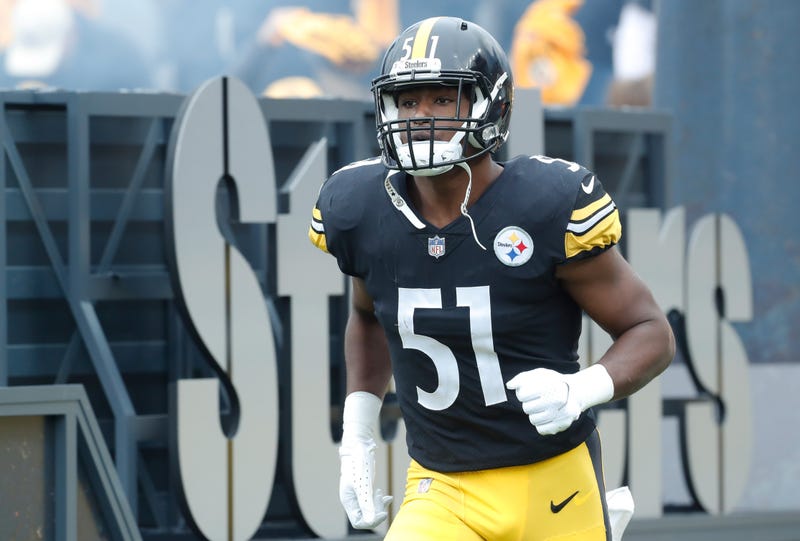 Myles Jack entering the field