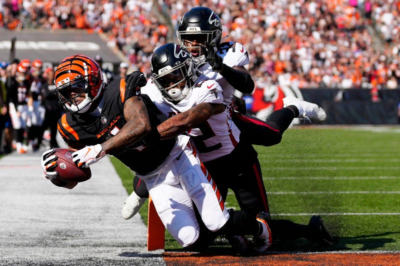 Oct 7, 2022; Cincinnati, OH, USA; Cincinnati Bengals wide receiver Ja'Marr Chase (1) pulls in a catch for a touchdown in the second quarter of the NFL Week 7 game between the Cincinnati Bengals and the Atlanta Falcons at Paycor Stadium in downtown Cincinnati on Sunday, Oct. 23, 2022. The Bengals led 28-17 at halftime. Mandatory Credit: Sam Greene-The Enquirer