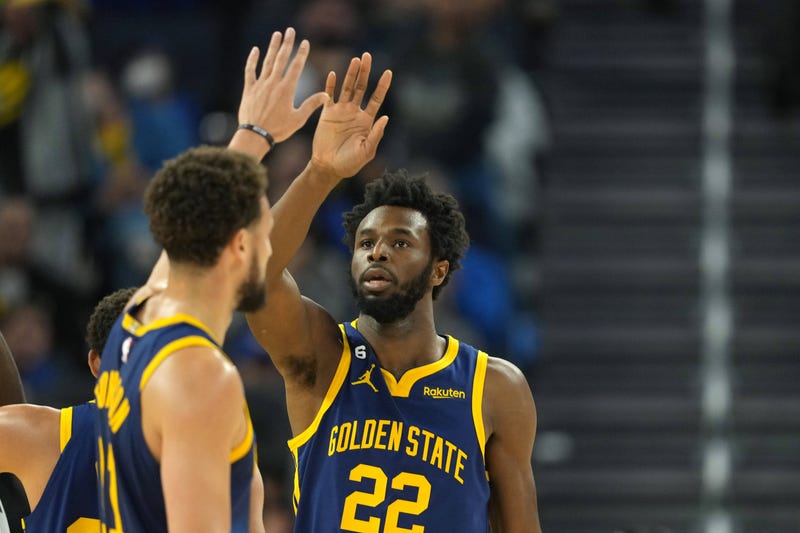 Oct 23, 2022; San Francisco, California, USA; Golden State Warriors forward Andrew Wiggins (22) high fives guard Klay Thompson (11) during the second quarter against the Sacramento Kings at Chase Center. 