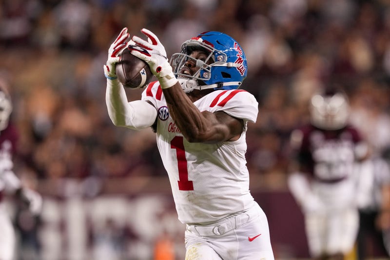 Mississippi Rebels wide receiver Jonathan Mingo (1) catches a pass against the Texas A&M Aggies in the second half at Kyle Field.