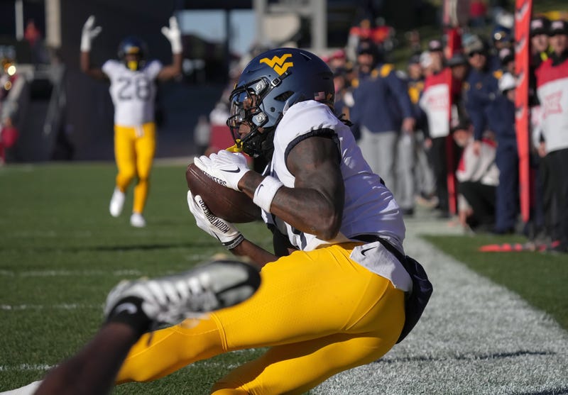 West Virginia receiver Bryce Ford-Wheaton catches a touchdown pass in the second quarter against Iowa State during a NCAA football game at Jack Trice Stadium in Ames on Saturday, Nov. 5, 2022.