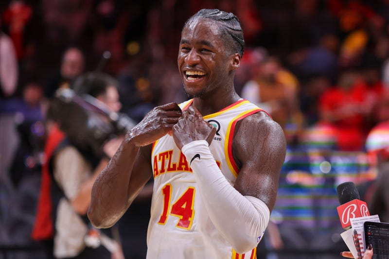 Nov 7, 2022; Atlanta, Georgia, USA; Atlanta Hawks forward AJ Griffin (14) celebrates after a victory against the Milwaukee Bucks at State Farm Arena. 
