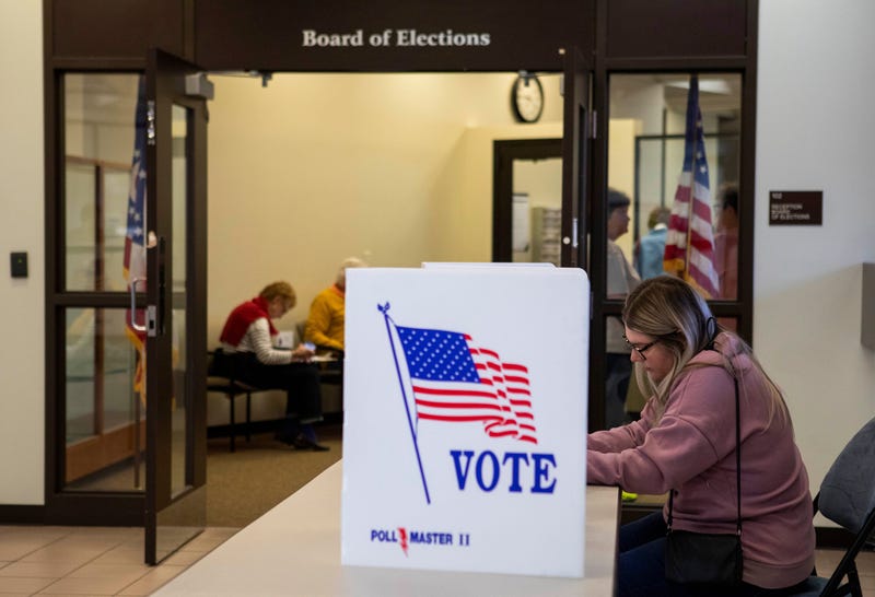 Woman casts her vote on Election Day 2022