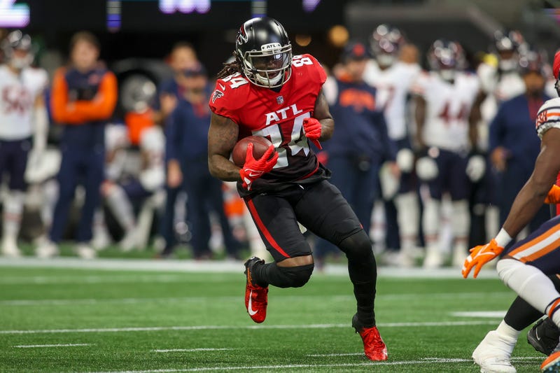 Nov 20, 2022; Atlanta, Georgia, USA; Atlanta Falcons running back Cordarrelle Patterson (84) runs the ball against the Chicago Bears in the first quarter at Mercedes-Benz Stadium.