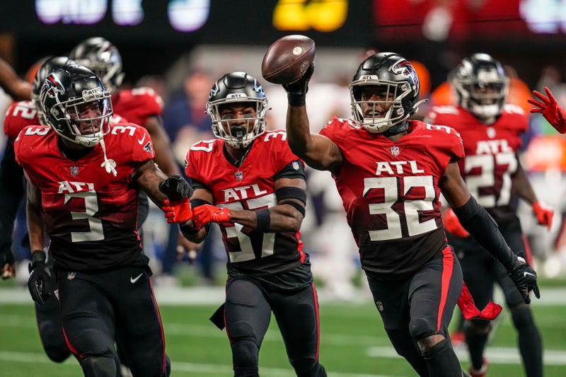 Nov 20, 2022; Atlanta, Georgia, USA; Atlanta Falcons safety Jaylinn Hawkins (32) reacts after intercepting a pass against the Chicago Bears during the fourth quarter at Mercedes-Benz Stadium. 