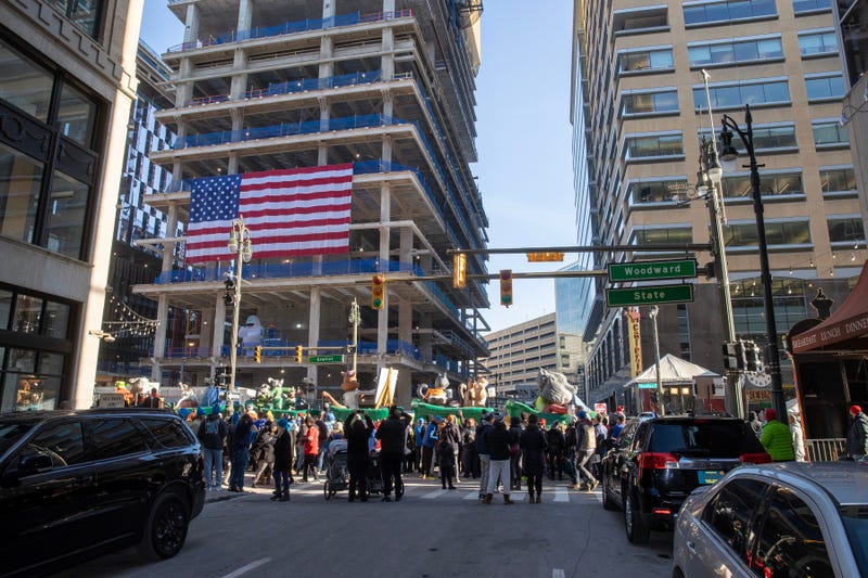 Detroit, Michigan, USA; People line up on Woodward Avenue for the Thanksgiving Day Parade in Detroit, Michigan before the Detroit Lions game