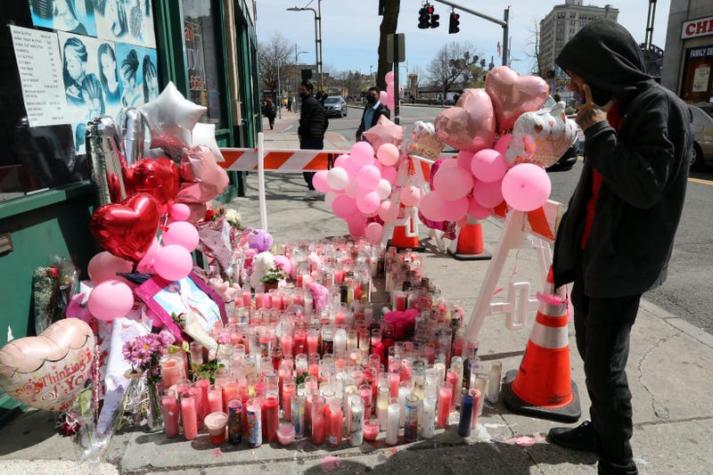 A pedestrian looks at the memorial for 16-year-old Kayla Green on April 11, 2022, in Mount Vernon.
